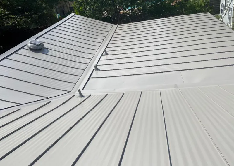 Solar attic fan installed on a metal roof for Roof Ventilation in Incline Village